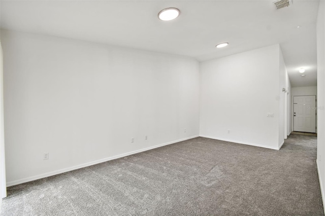 unfurnished room with carpet floors