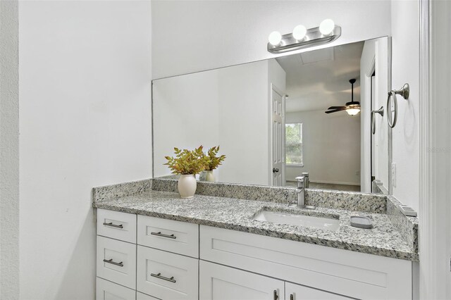 bathroom with vanity and ceiling fan