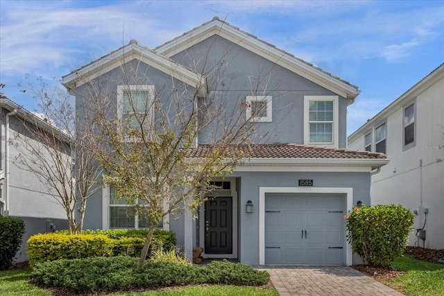 view of front of property with a garage