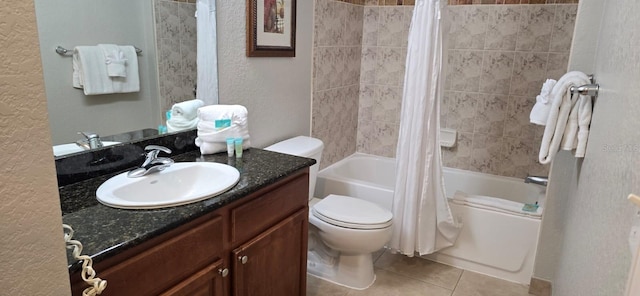 full bathroom with toilet, tile floors, large vanity, and shower / bath combo with shower curtain