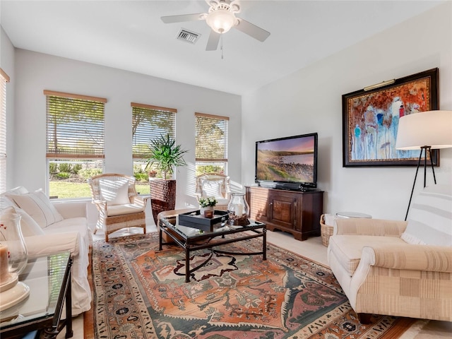 living room featuring ceiling fan