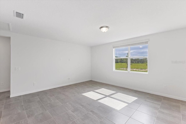 view of tiled empty room