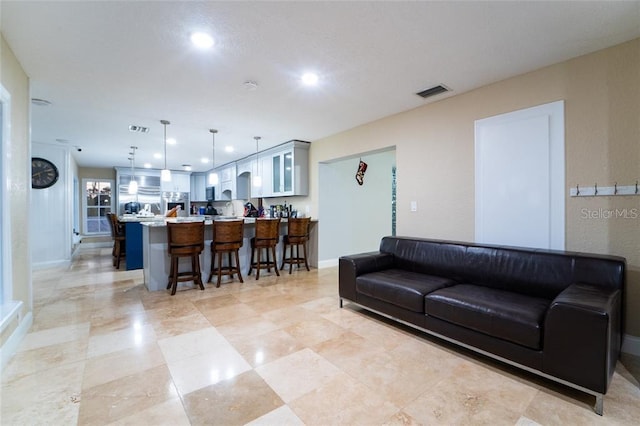 living room featuring light tile patterned floors