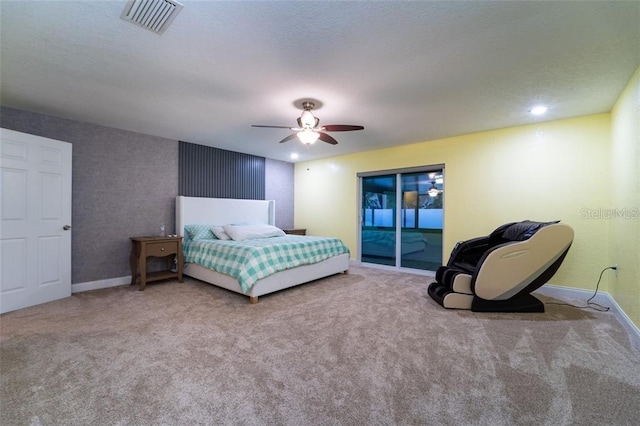 bedroom with ceiling fan, access to outside, and light colored carpet