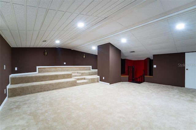 basement with carpet flooring