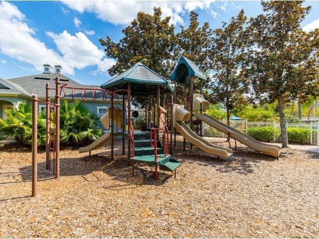 community play area featuring fence