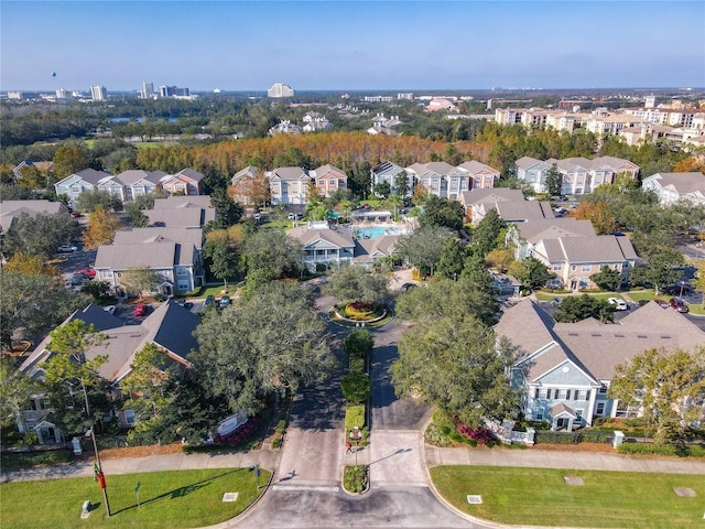 birds eye view of property with a residential view