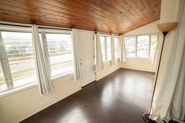 interior space featuring a healthy amount of sunlight, wooden ceiling, and lofted ceiling