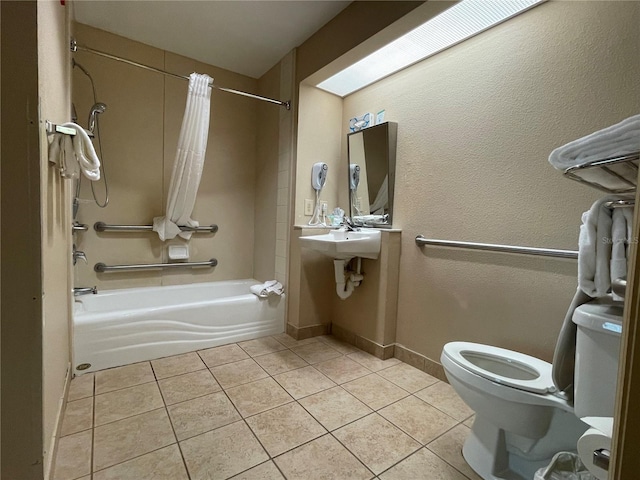 full bathroom featuring shower / bath combination with curtain, tile flooring, toilet, and sink