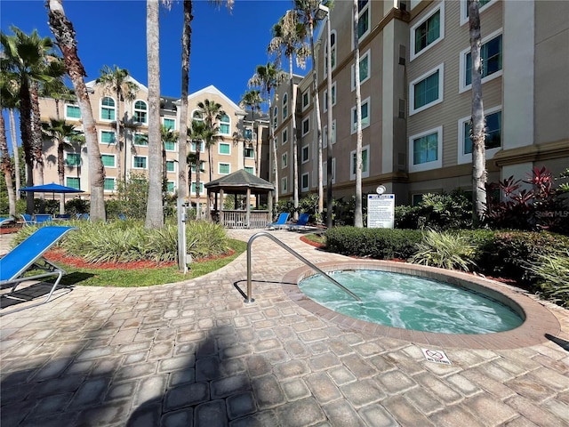 view of swimming pool featuring a gazebo