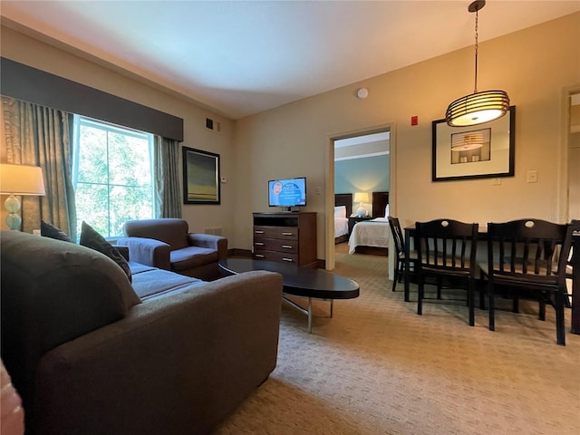 living room featuring light colored carpet