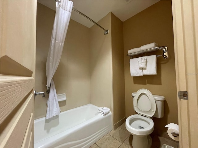 bathroom with tile patterned floors, toilet, and shower / bathtub combination with curtain