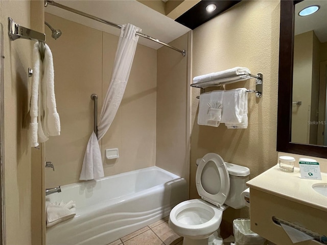 full bathroom with tile patterned floors, toilet, shower / tub combo, and vanity