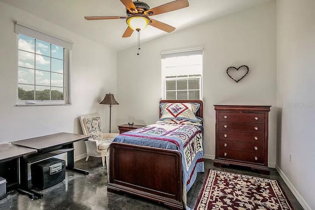 bedroom with lofted ceiling and ceiling fan