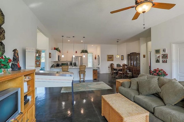 living room with ceiling fan