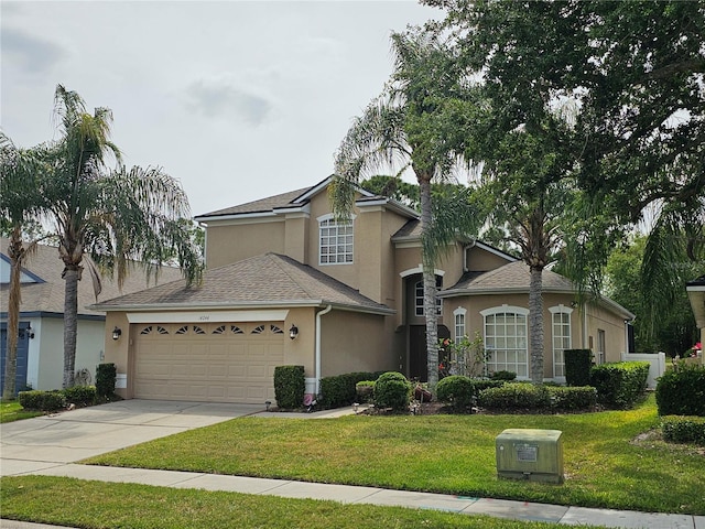 front of property with a garage and a front lawn