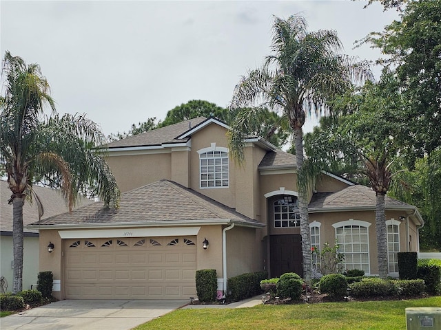 view of front of home with a garage