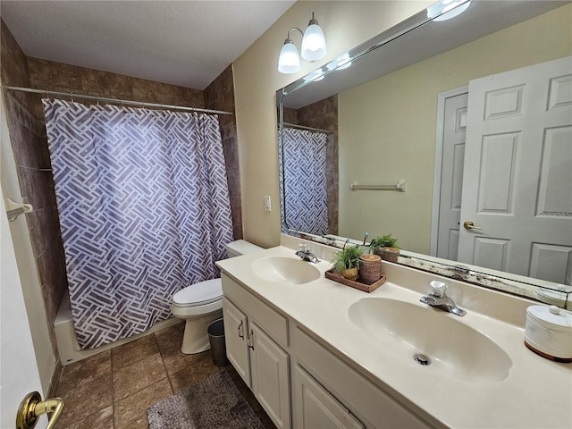 full bathroom featuring tile patterned floors, a textured ceiling, vanity, shower / bathtub combination with curtain, and toilet