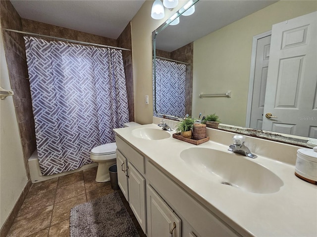 full bathroom featuring shower / tub combo with curtain, vanity, and toilet