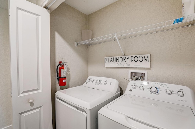 laundry room with washer and dryer and hookup for a washing machine