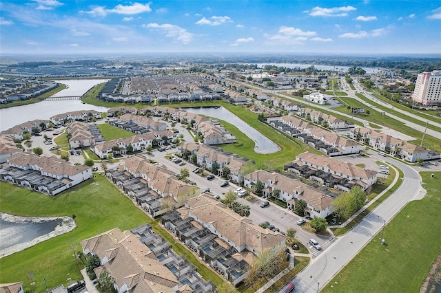 bird's eye view with a water view