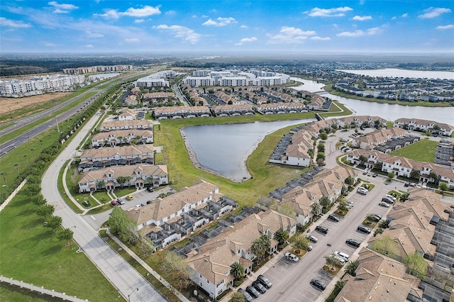 bird's eye view with a water view