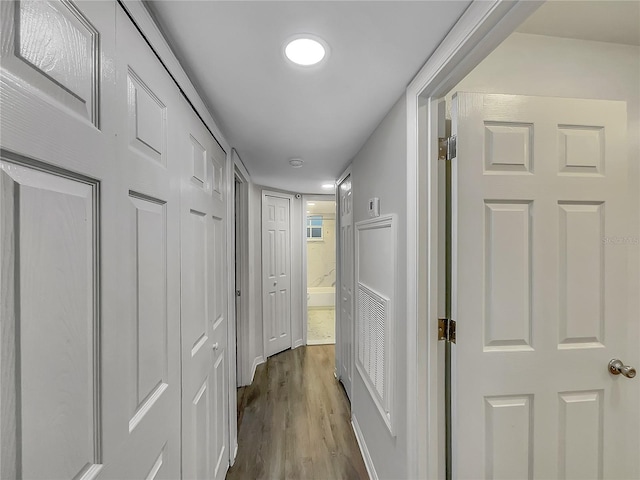 hallway featuring hardwood / wood-style floors