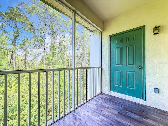 unfurnished sunroom with a wealth of natural light