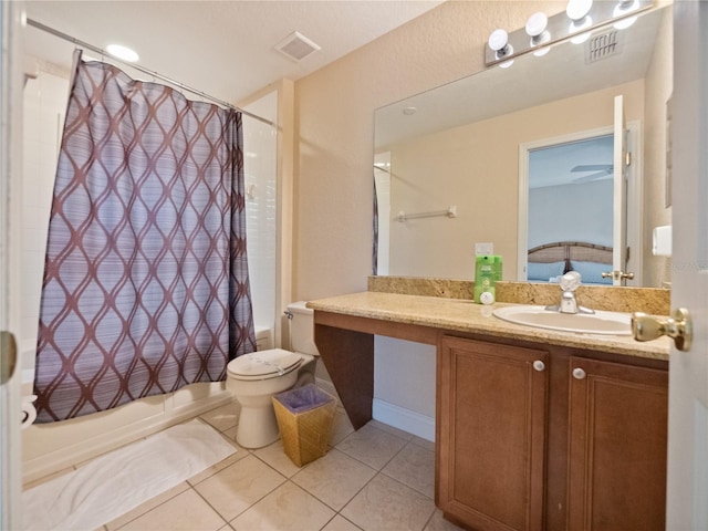 full bathroom with shower / bathtub combination with curtain, tile patterned flooring, vanity, and toilet