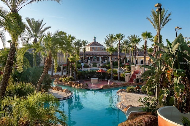 view of swimming pool with a patio area