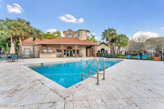 view of pool featuring a patio