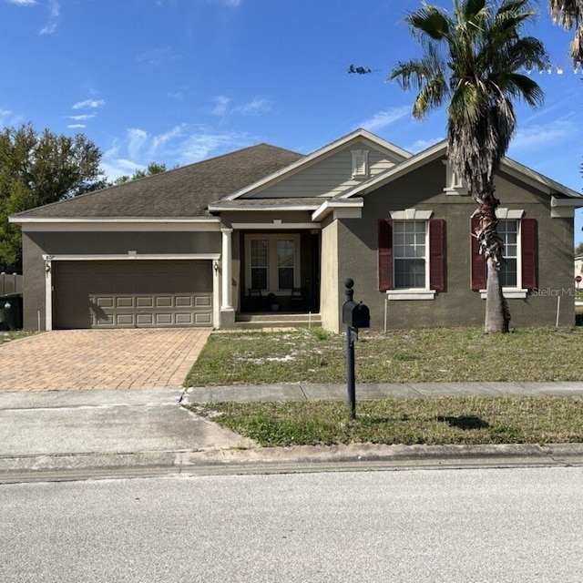 view of front of property featuring a garage