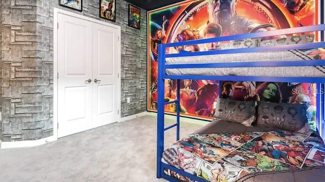 bedroom featuring concrete flooring