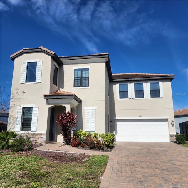 view of front of property featuring a garage