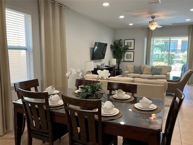 dining space with recessed lighting, light tile patterned flooring, ceiling fan, and visible vents