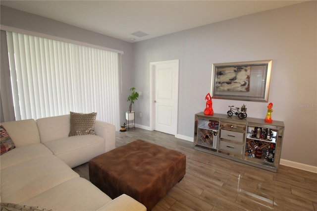 living room with hardwood / wood-style flooring