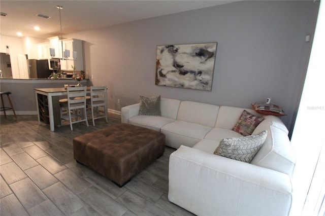 living room featuring hardwood / wood-style flooring