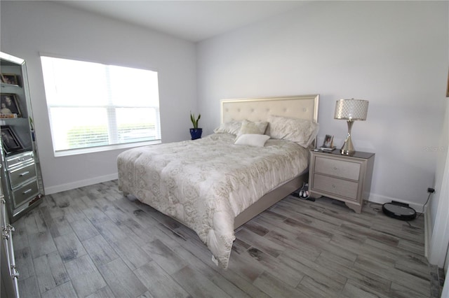 bedroom featuring hardwood / wood-style flooring