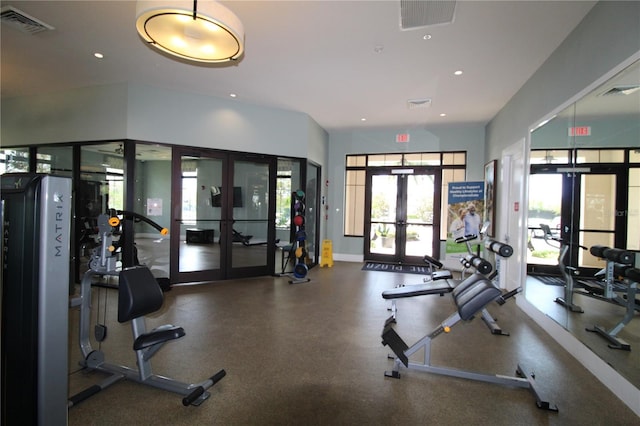 gym featuring french doors