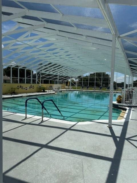 view of swimming pool with a patio