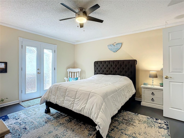 bedroom featuring french doors, access to exterior, ceiling fan, dark wood-type flooring, and a textured ceiling