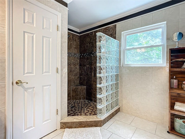 bathroom featuring tile walls, ornamental molding, and tile flooring