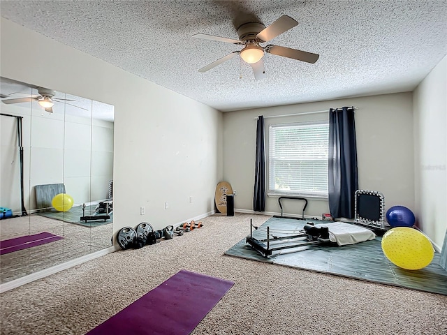 workout room featuring carpet floors and ceiling fan