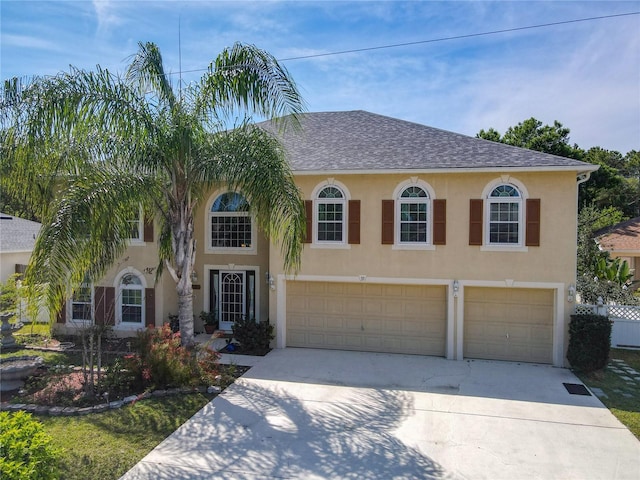 view of front of home with a garage