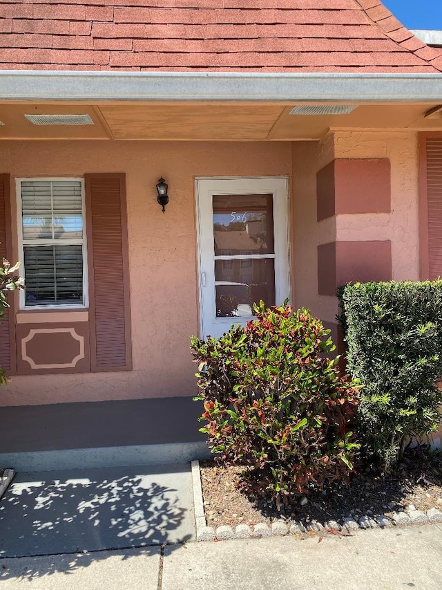 property entrance with a porch