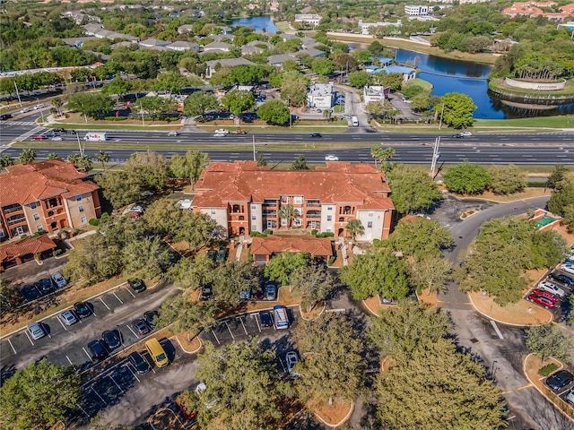 birds eye view of property featuring a water view