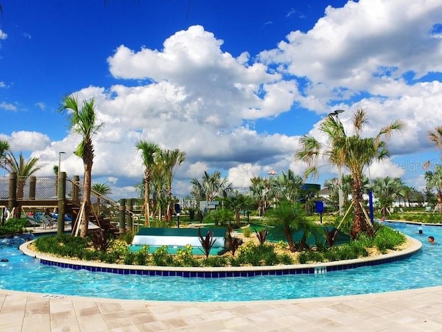 view of community featuring a swimming pool