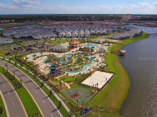 drone / aerial view with a water view