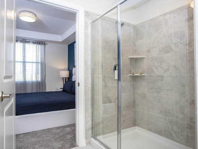 ensuite bathroom with a stall shower and ensuite bath