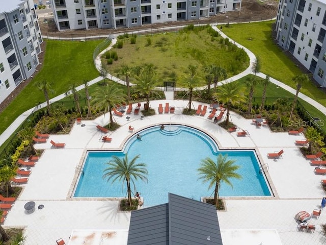 view of swimming pool with a patio area